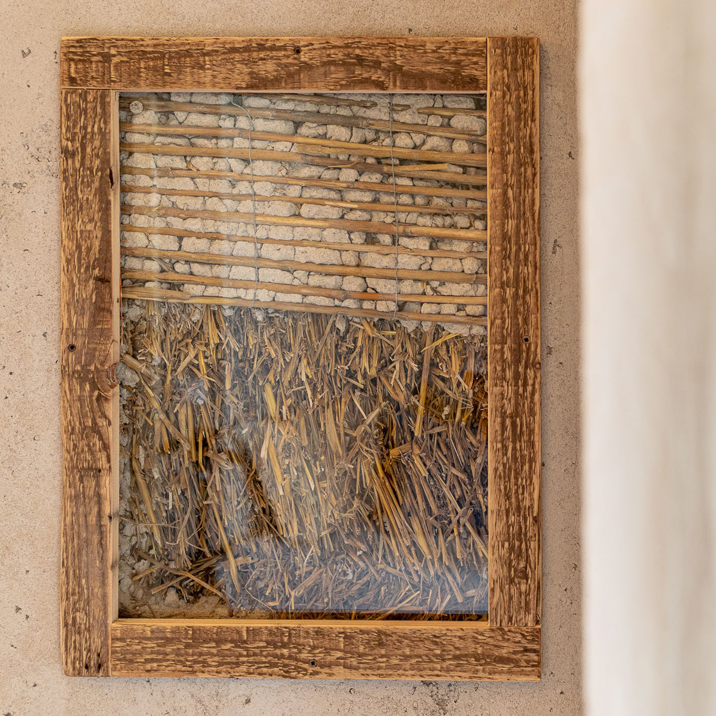 Casa Viva is a straw bale construction. The “ window of truth” allows us to have a peak at the soul of Casa Viva.